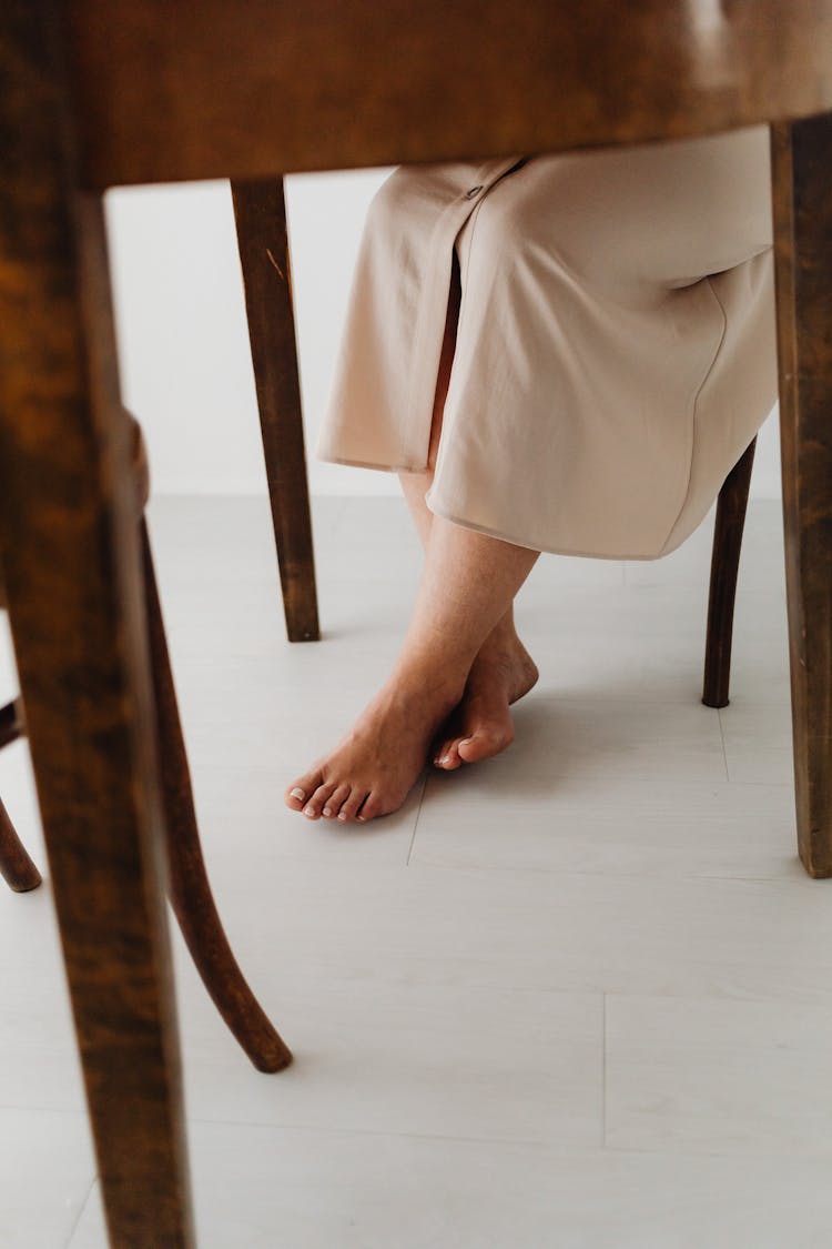 Female Feet Under Table