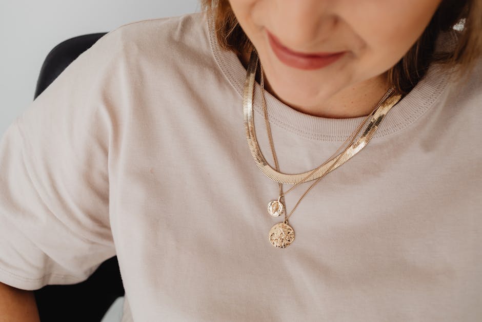 Close-up on Gold Necklaces Around Womans Neck