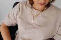 Woman in White Crew Neck Long Sleeve Shirt