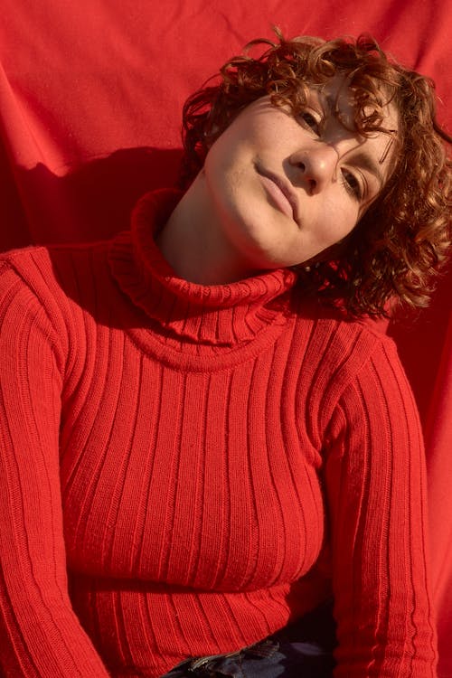 Portrait Photo of Short-Haired Woman in Red Turtleneck Sweater