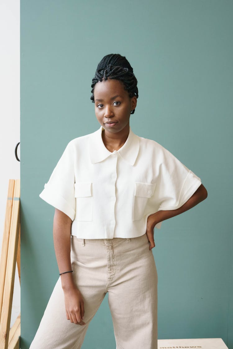 Stylish Black Model With Hand On Hip Indoors