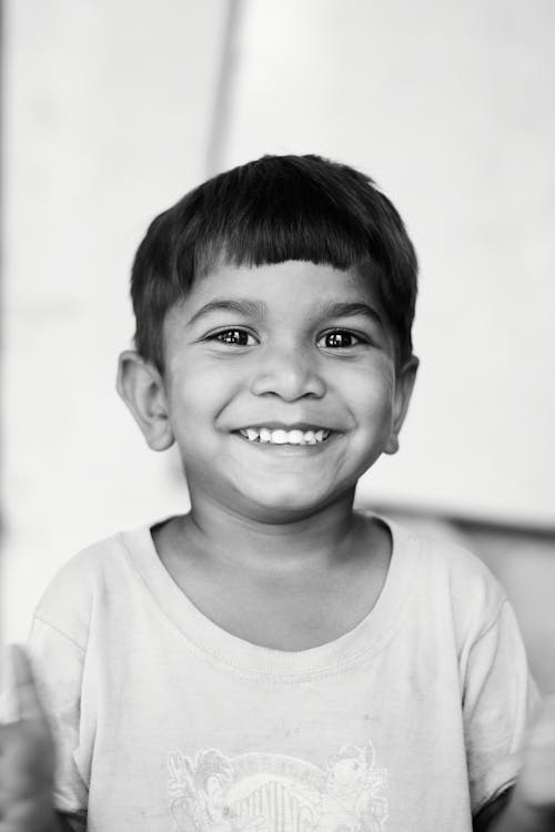 Monochrome Photo of a Cute Boy Smiling