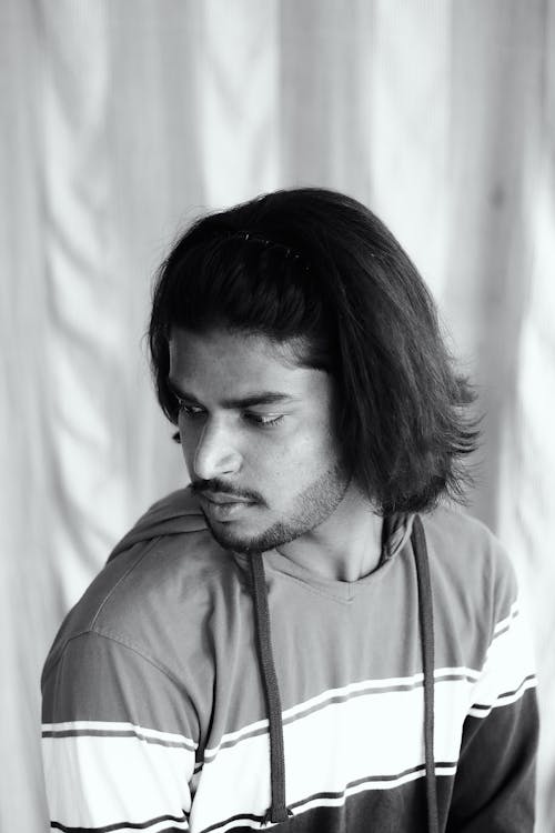 Free Monochrome Photo of a Man with Facial Hair Looking Away Stock Photo