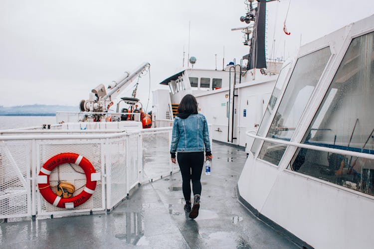 Back View Of A Woman On A Ship