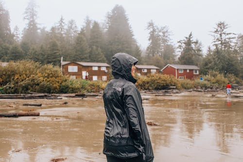 A Person in Black Raincoat