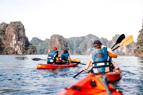 People Riding Kayak