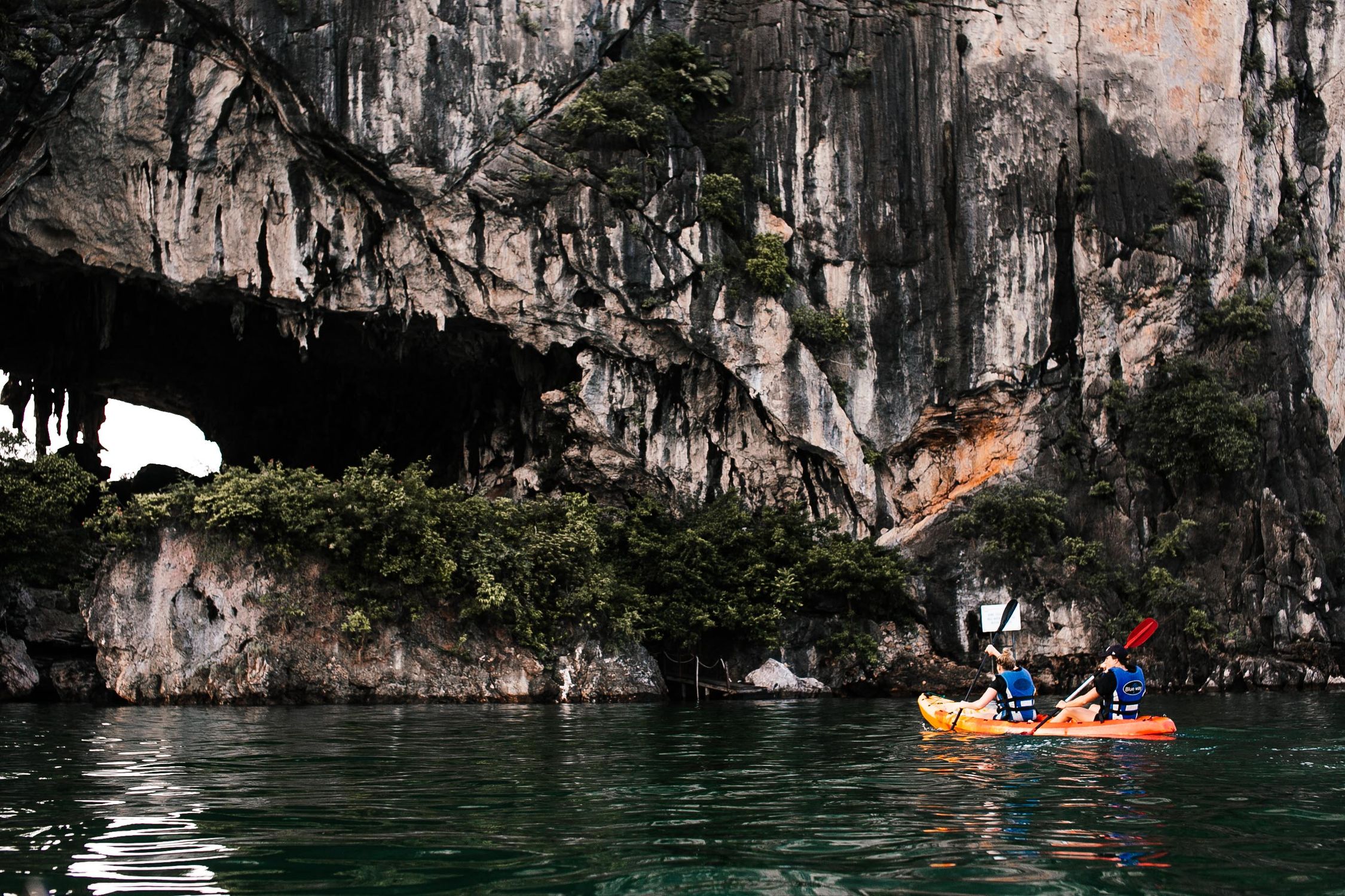 People Kayaking near a Limestone Karst · Free Stock Photo