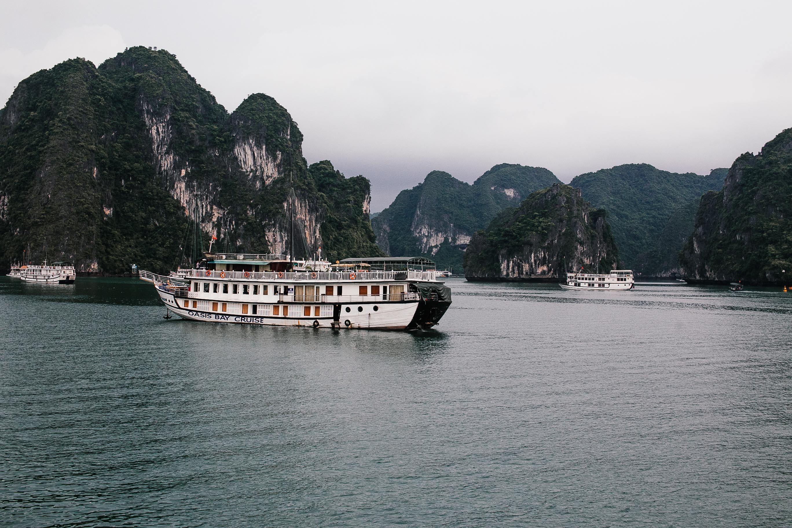 Luxury cruise ship sailing through Ha Long Bay, Vietnam