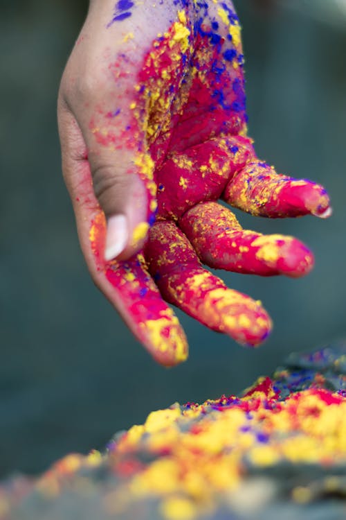 Free Person With Pink an Yellow Holi Powder Stock Photo