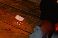 Medicine Tablets on the Wooden Floor