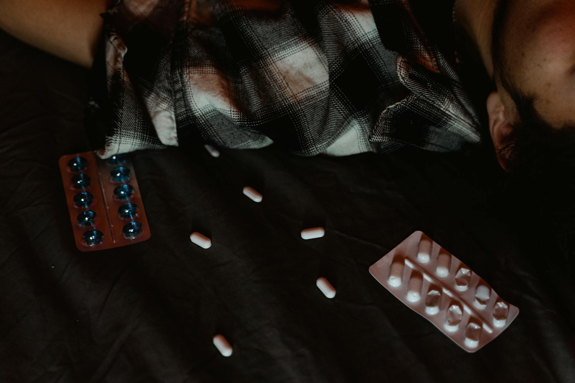 Medicine Tablets on the Bed