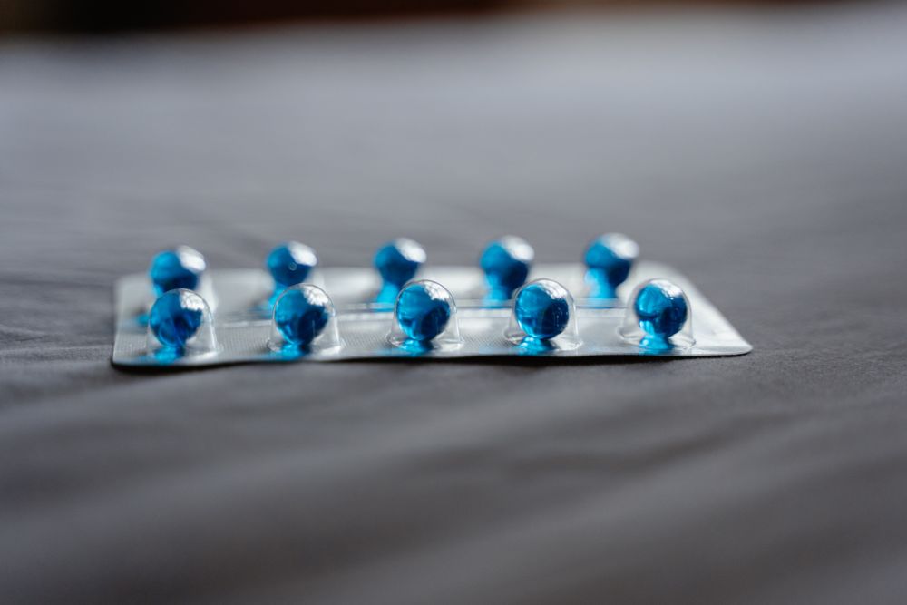 Blister pack of blue capsules