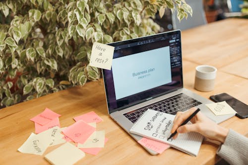 Free Sticky Notes and a Laptop Stock Photo
