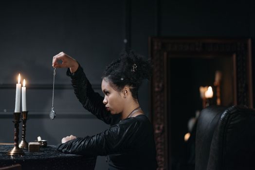 Woman in Black Long Sleeve Shirt Holding a Pocket Watch