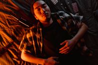 Man in Brown and Black Button Up Shirt