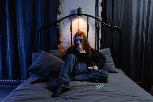 Woman Sitting on the Bed
