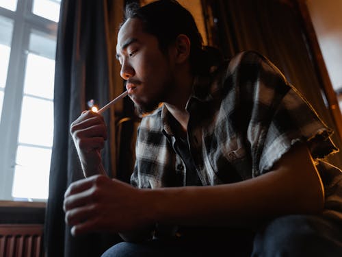 Man Lighting a Cigarette