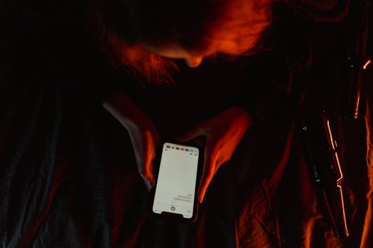 A person using an at-home IPL device for hair removal on their arm.