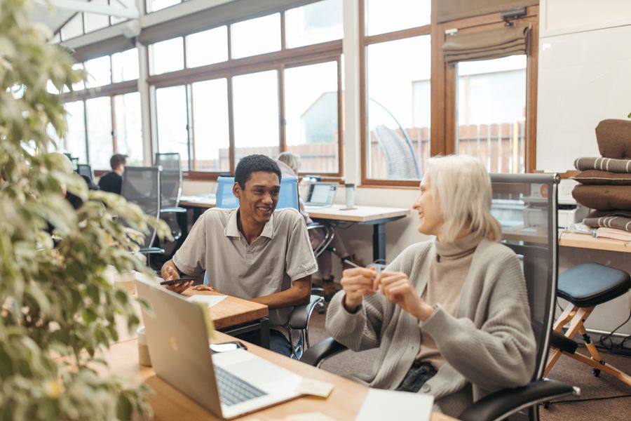 A team laughing during a working session, photo by Anastasia Shuraeva on Pexels