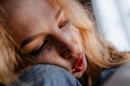 Free Close-Up Shot of a Depressed Woman Stock Photo