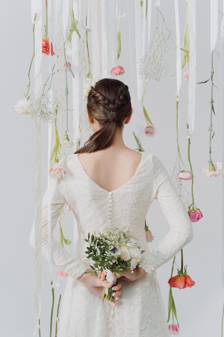 Back View Of A Bride, And A Floral Installation