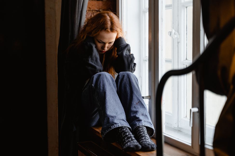 person feeling anxious alone