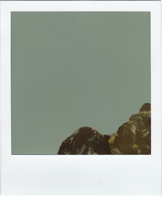 Minimalist abstract artwork featuring geometric form against a neutral background.