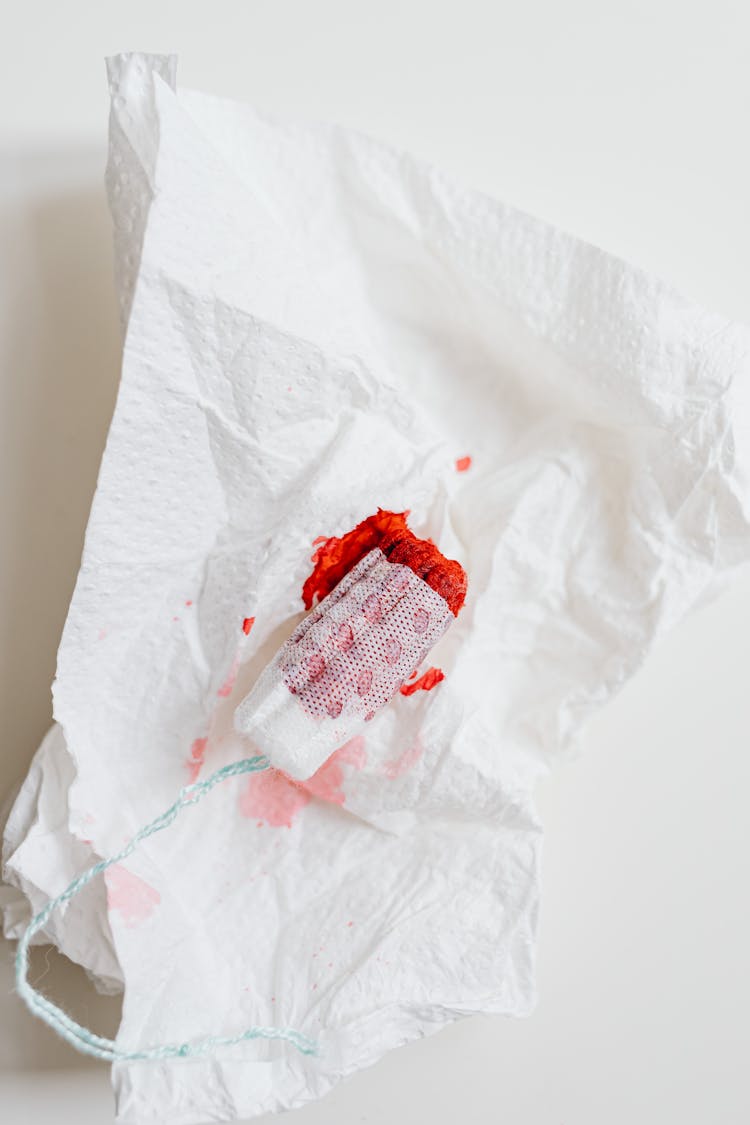 Close-Up Shot Of A Tampon With Blood