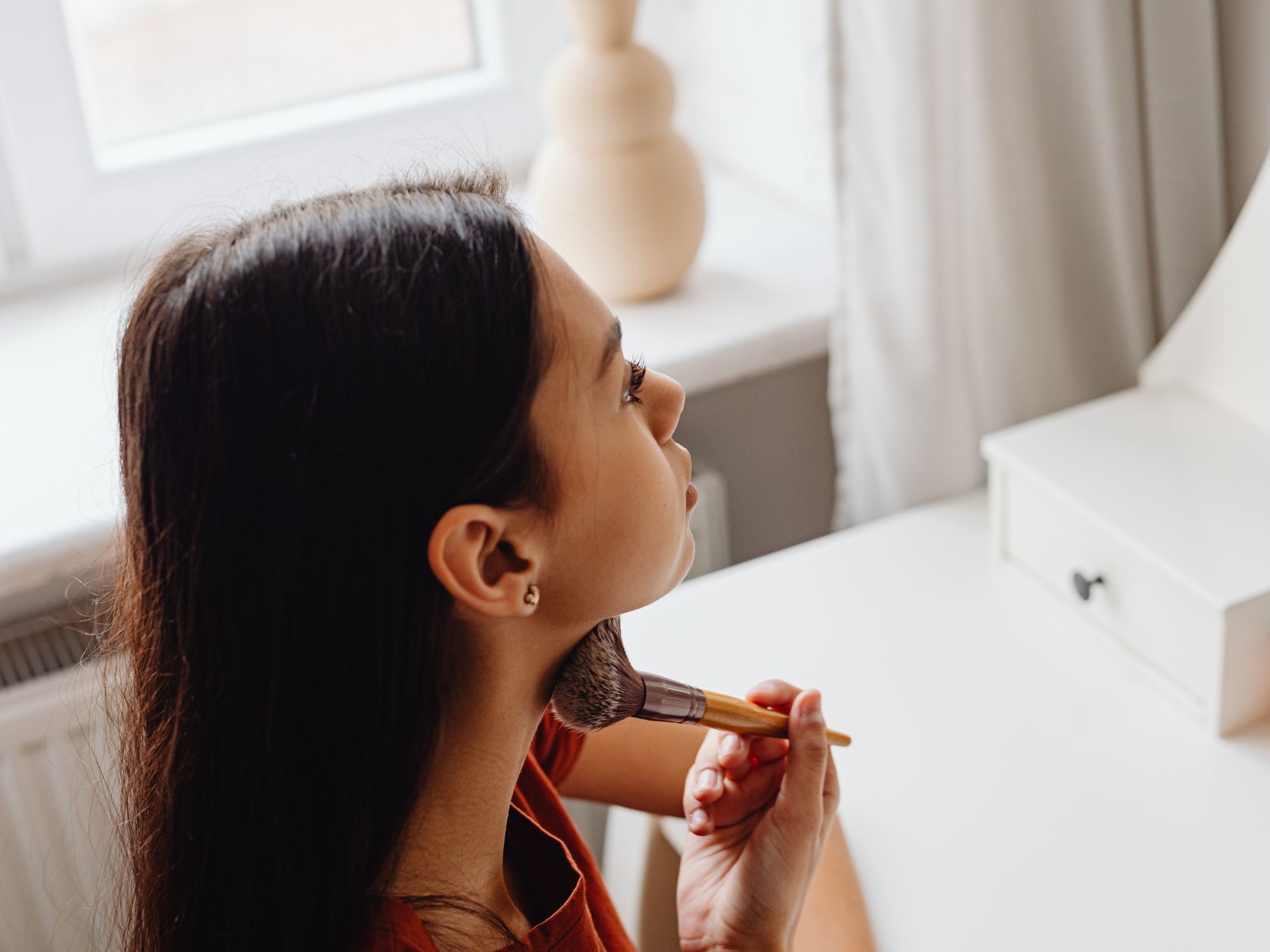 Wallpapering in Westcombe Park, Greenwich — decorator hanging pattern-matched wallpaper