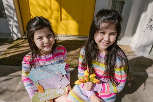 Twins Wearing Striped Dresses