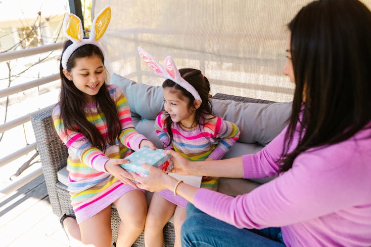 Girl Receiving A Gift