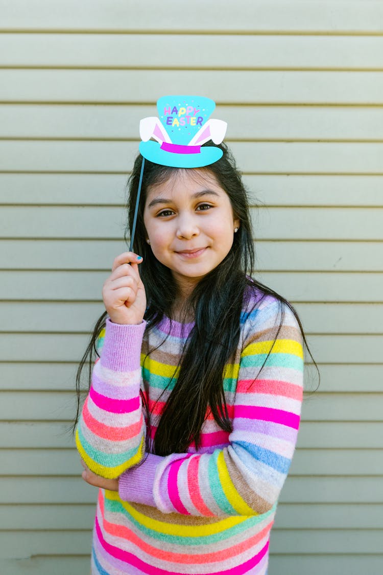 Girl Holding A Photo Prop