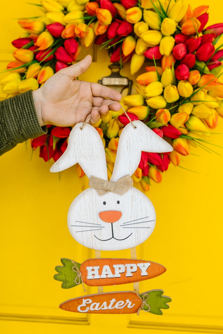 A Person Holding Easter Decorations