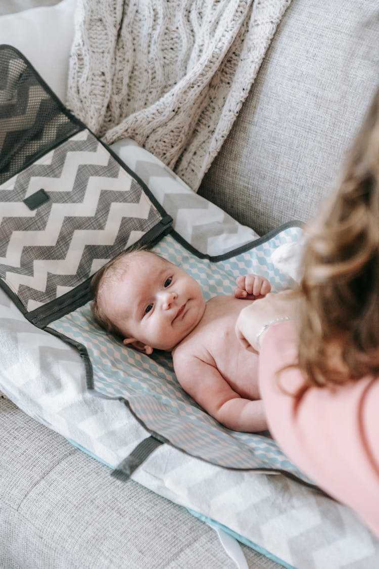 Baby Lying On A Changing Mat