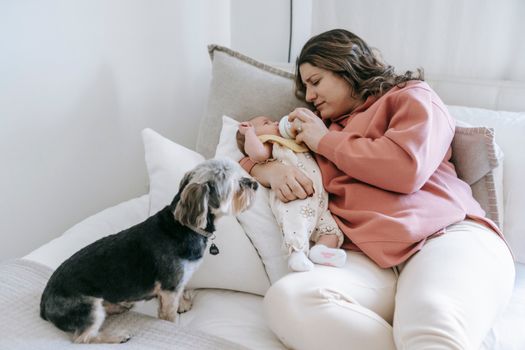Mother Feeding her Child