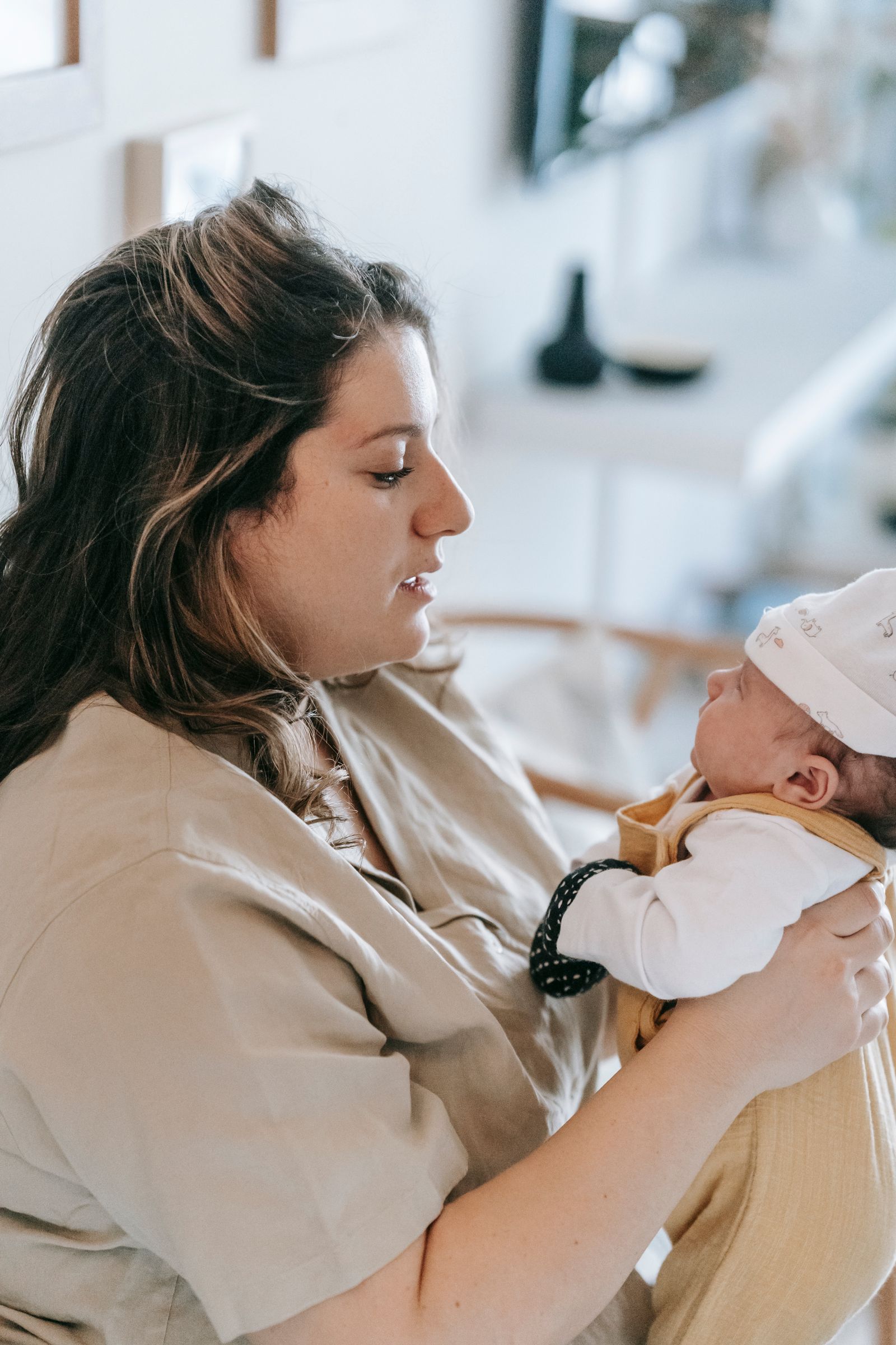 new mother holding her newborn baby