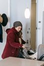 Woman in hat with stroller