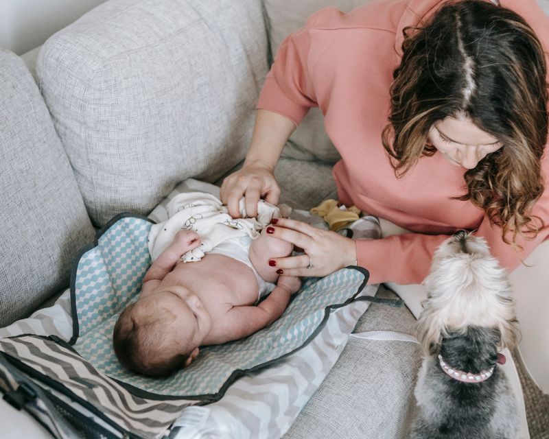 Mom caring for her newborn at home