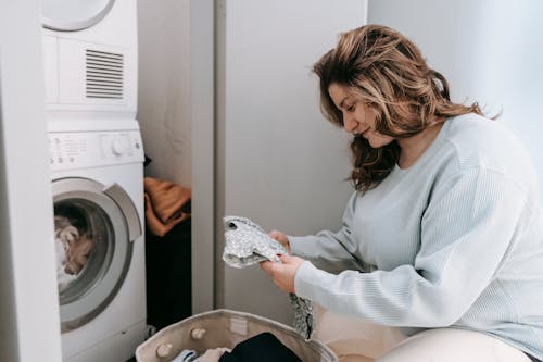Free A Woman doing Laundry Stock Photo