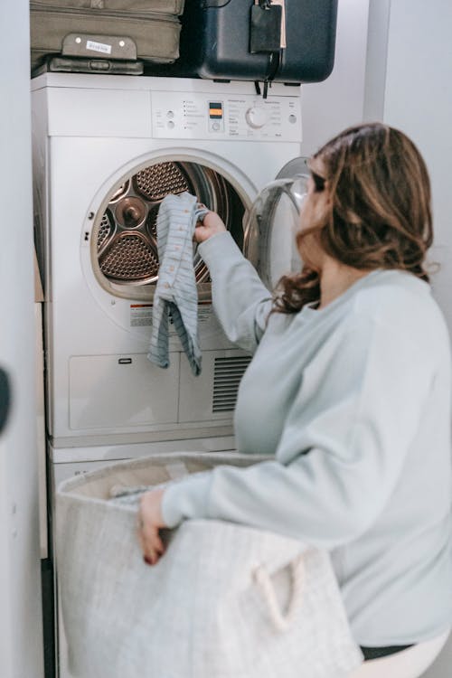 Free A Woman doing Laundry Stock Photo