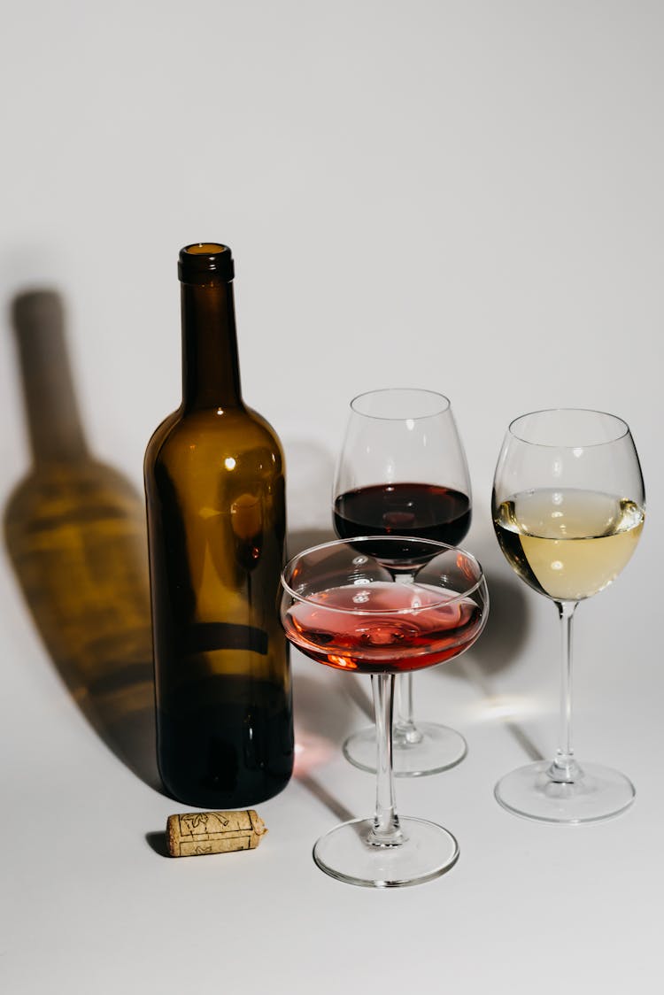 Wine Bottle And Wine Glasses On Table