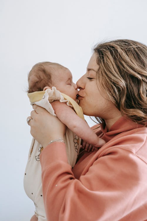 Mother Kissing Her Baby