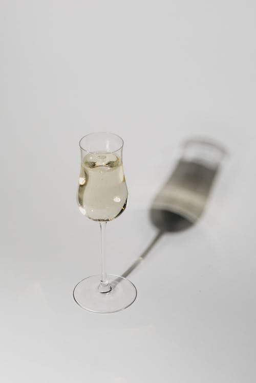 Free White Wine in a Clear Glass Stock Photo