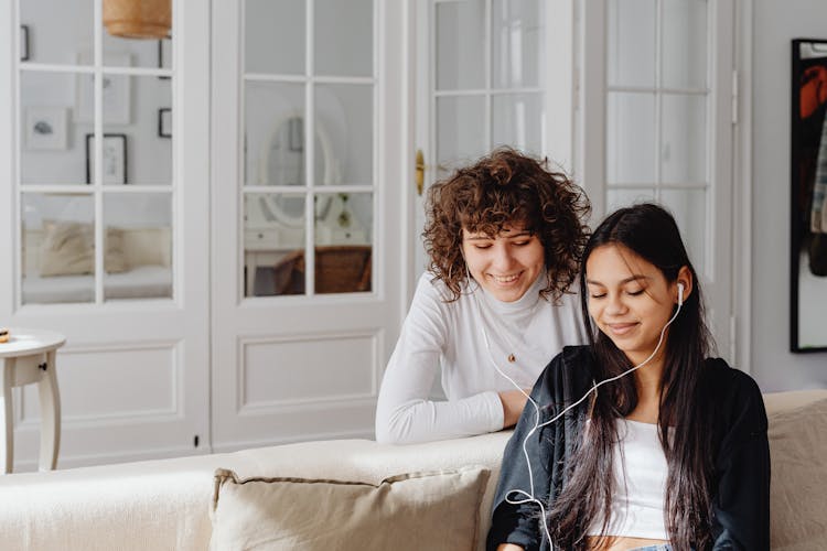 Friends Listening To Music Together