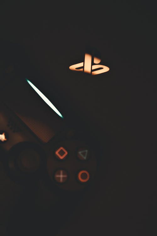 Free stock photo of game controller, paper airplane, playstation Stock Photo