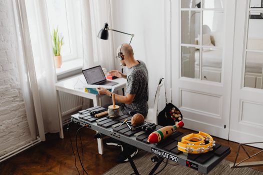 musician headphones laptop