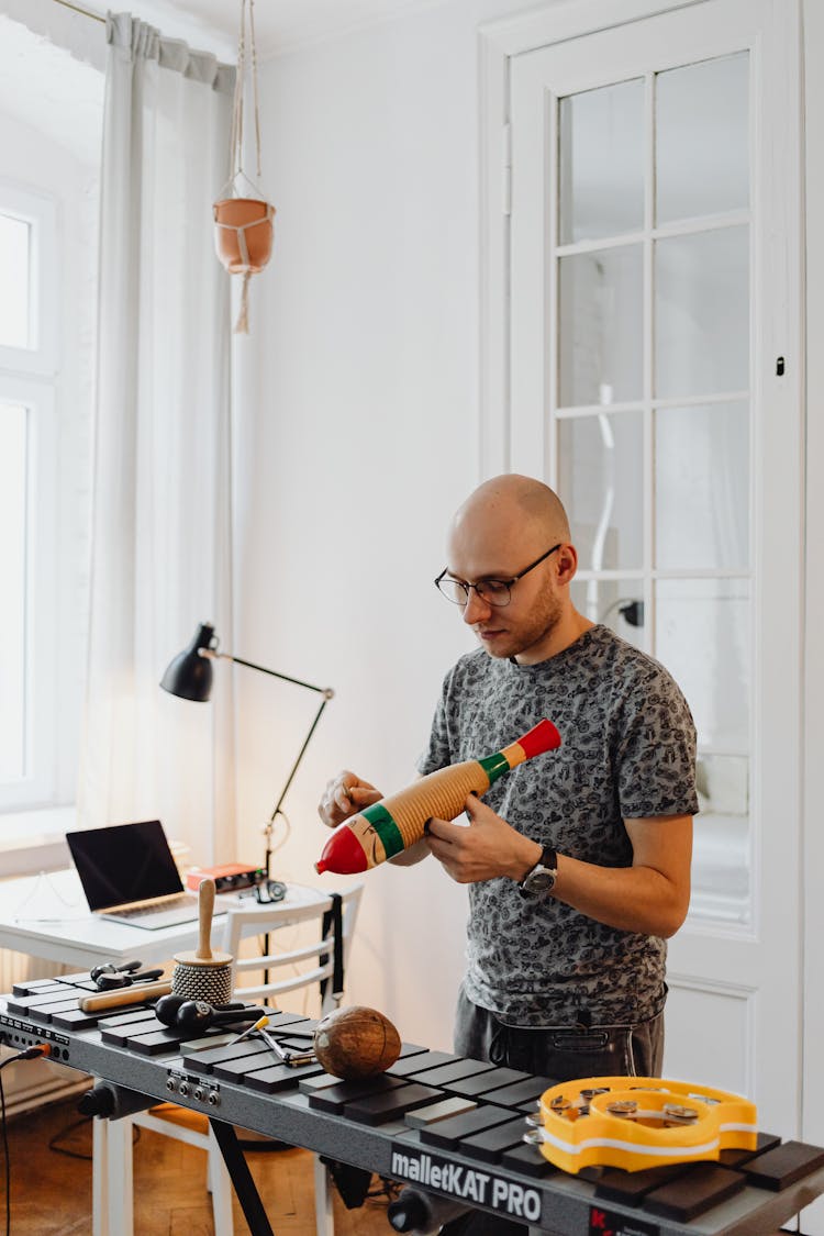 Man With Toy And Keyboard