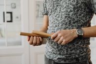 Close-Up Shot of a Person Playing Wooden Claves
