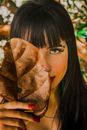 Woman Covering Her Face With Brown Dried Leaf