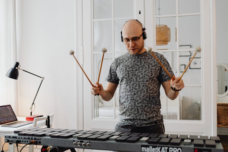 Man Playing Black Xylophone